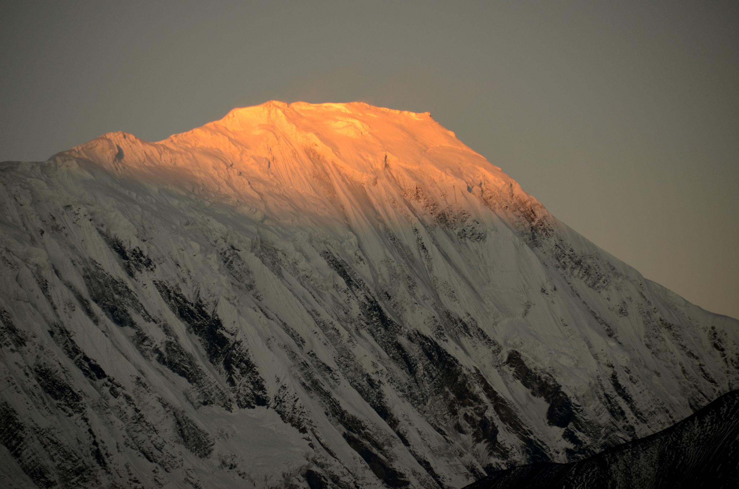 07 First Rays Of Sunrise Strike La Grande Barriere and Tilicho Peak Close Up From Manang 